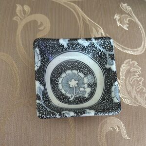 Brown and Blue Ceramic Art with Intricate Design